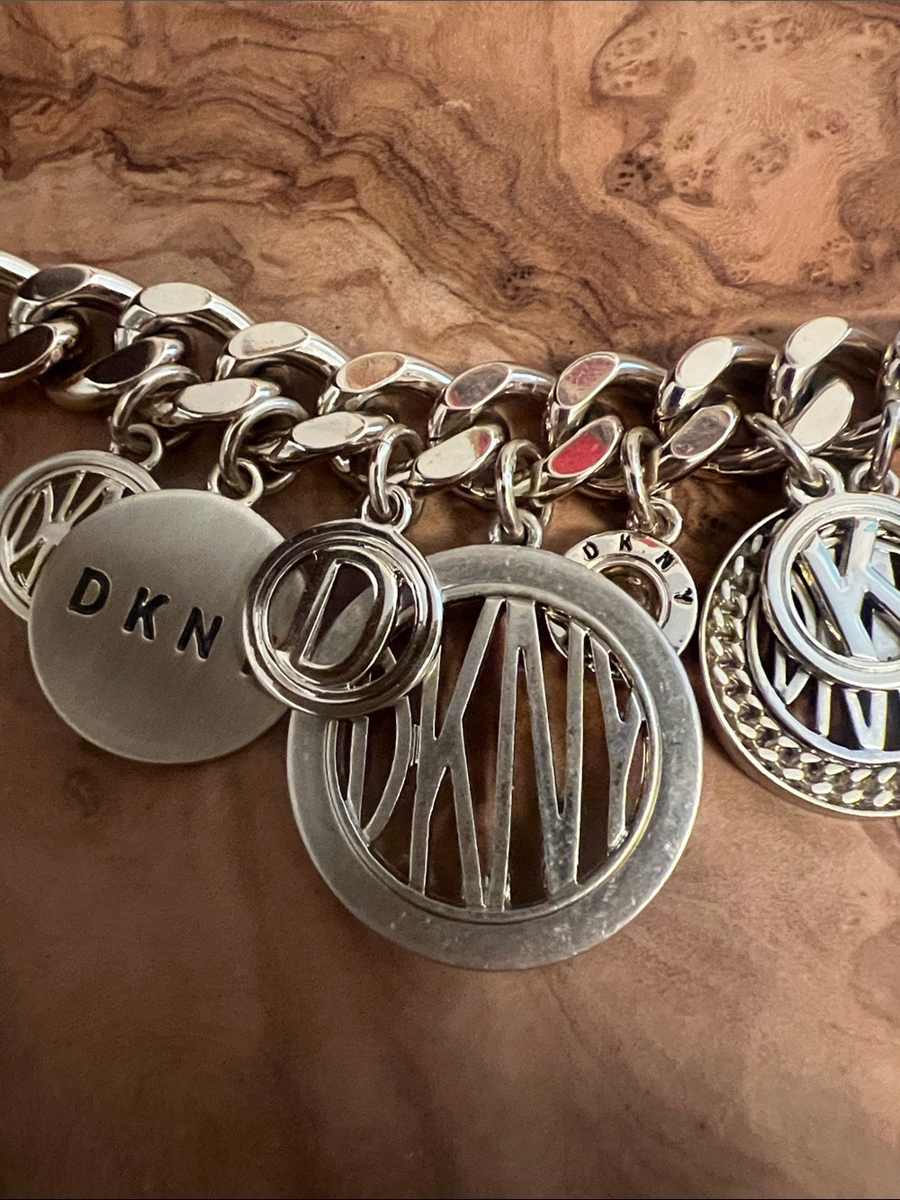 DKNY Gold-Tone Charm Bracelet with Multiple Logo Discs - Picture 3 of 5